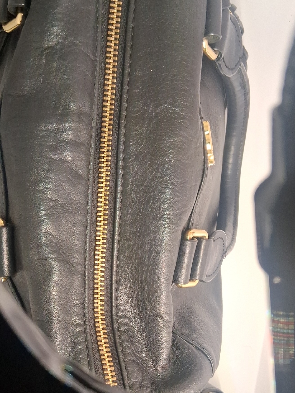 UGG Black Leather Satchel with Tassel and Gold Hardware - Picture 4 of 5